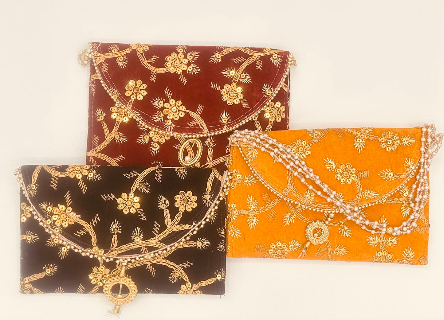 Emdroidered Clutches